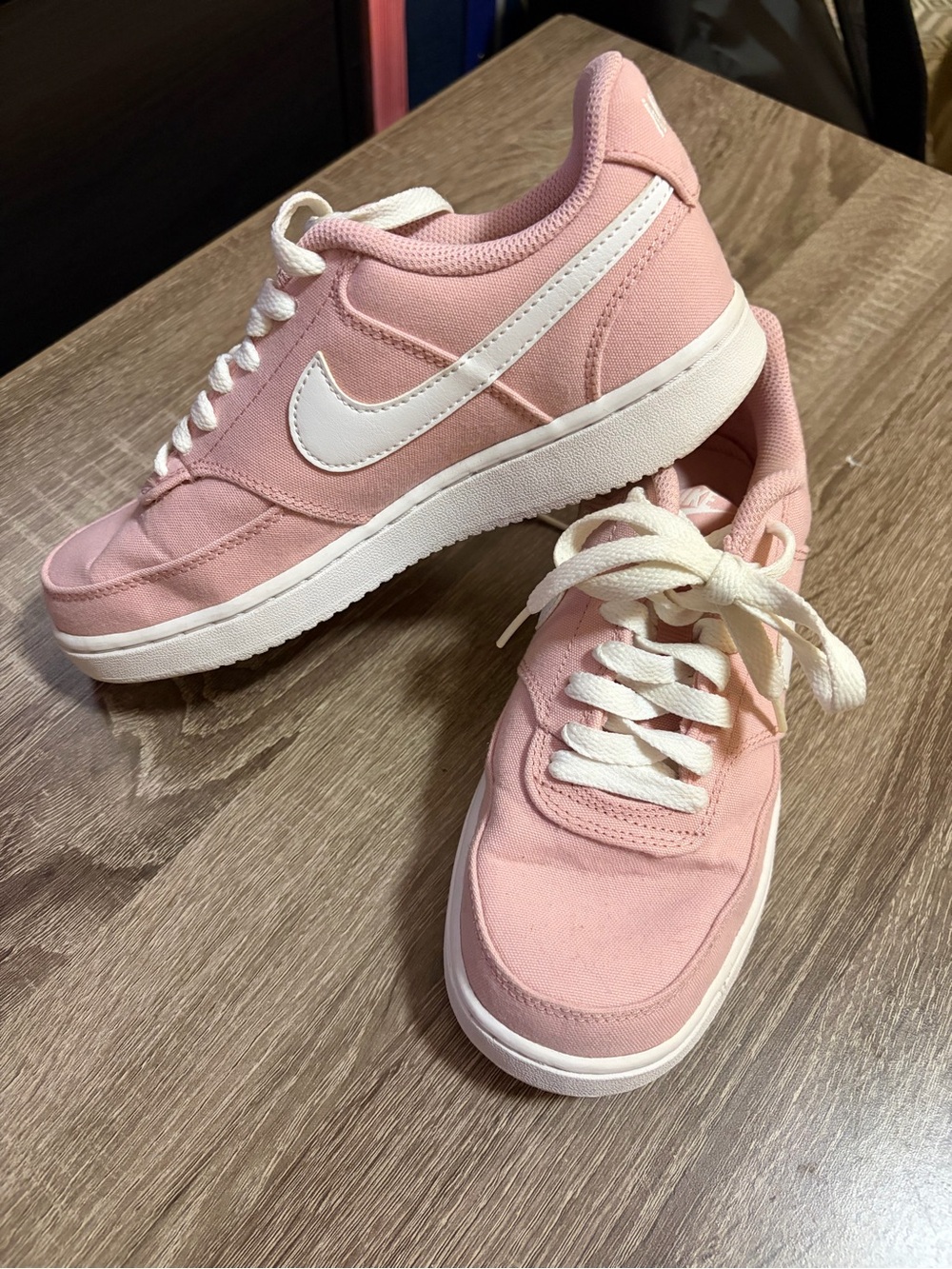Nike Women’s Pink Canvas Low-Top Sneakers with White Swoosh